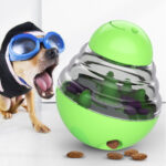 Tumbler feeder dog